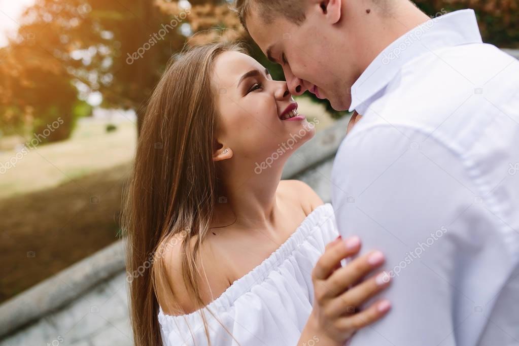 couple posing in the park