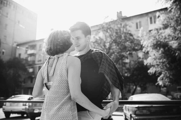 Happy couple in the street looking each other — Stock Photo, Image