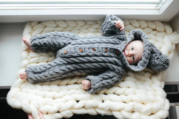 Small baby in knitted clothes — Stock Photo, Image