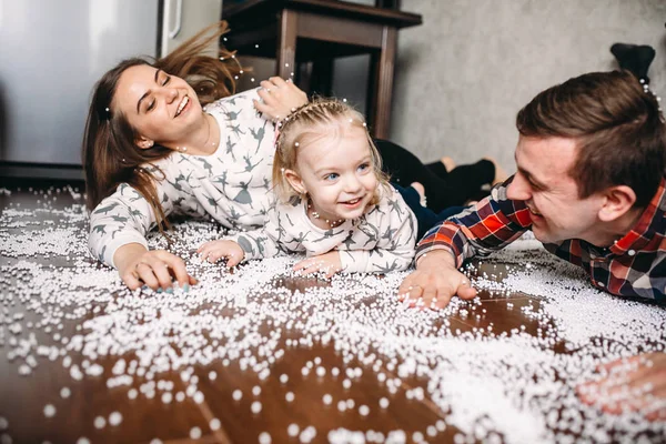 Happy family playing together on the floor — Stock Photo, Image