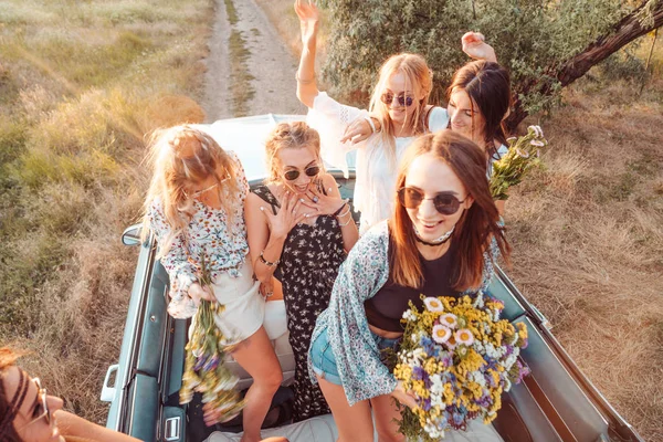 Six girls have fun in the countryside