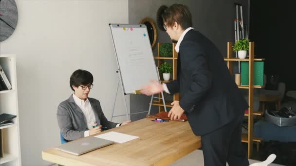 Businessmen arguing at workplace, disagreeing over document — 비디오