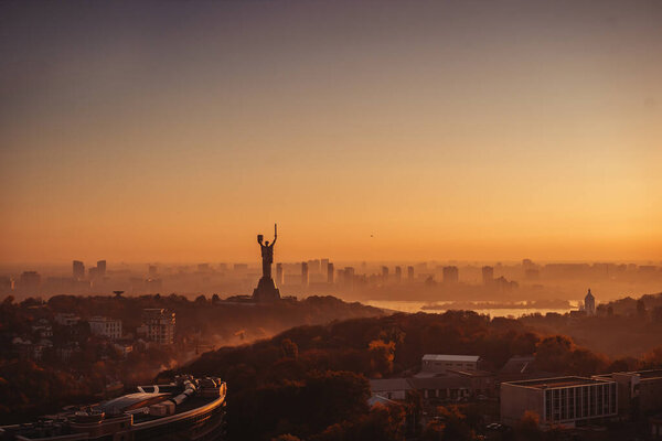 Mother Motherland monument at sunset. In Kiev, Ukraine.