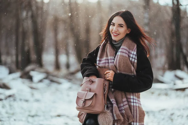 Young beautiful model posing in winter forest. stylish fashion portrait — Stock Photo, Image