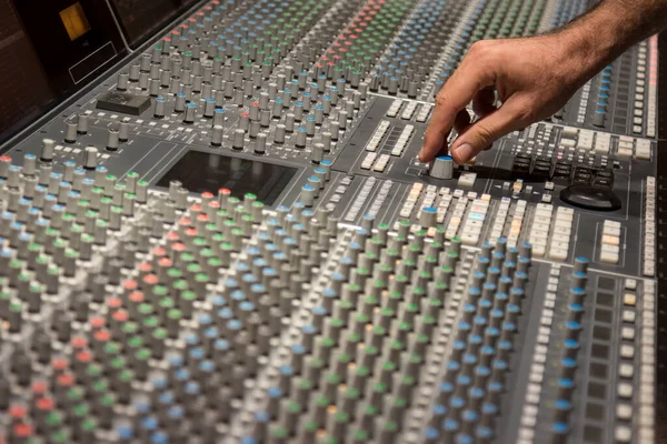 Sound settings on the mixing desk of a recording studio