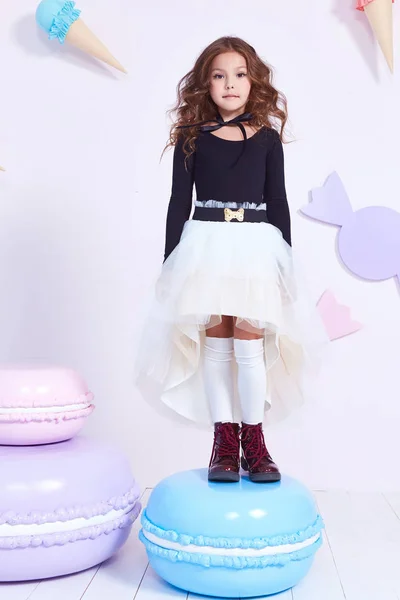 Cute little baby girl fashion pretty model dark blonde curly — Stock Photo, Image
