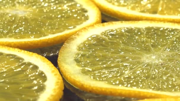 Orange Thinly Sliced Lobules Lies Dark Background Juicy Tasty Citrus — Stock Video