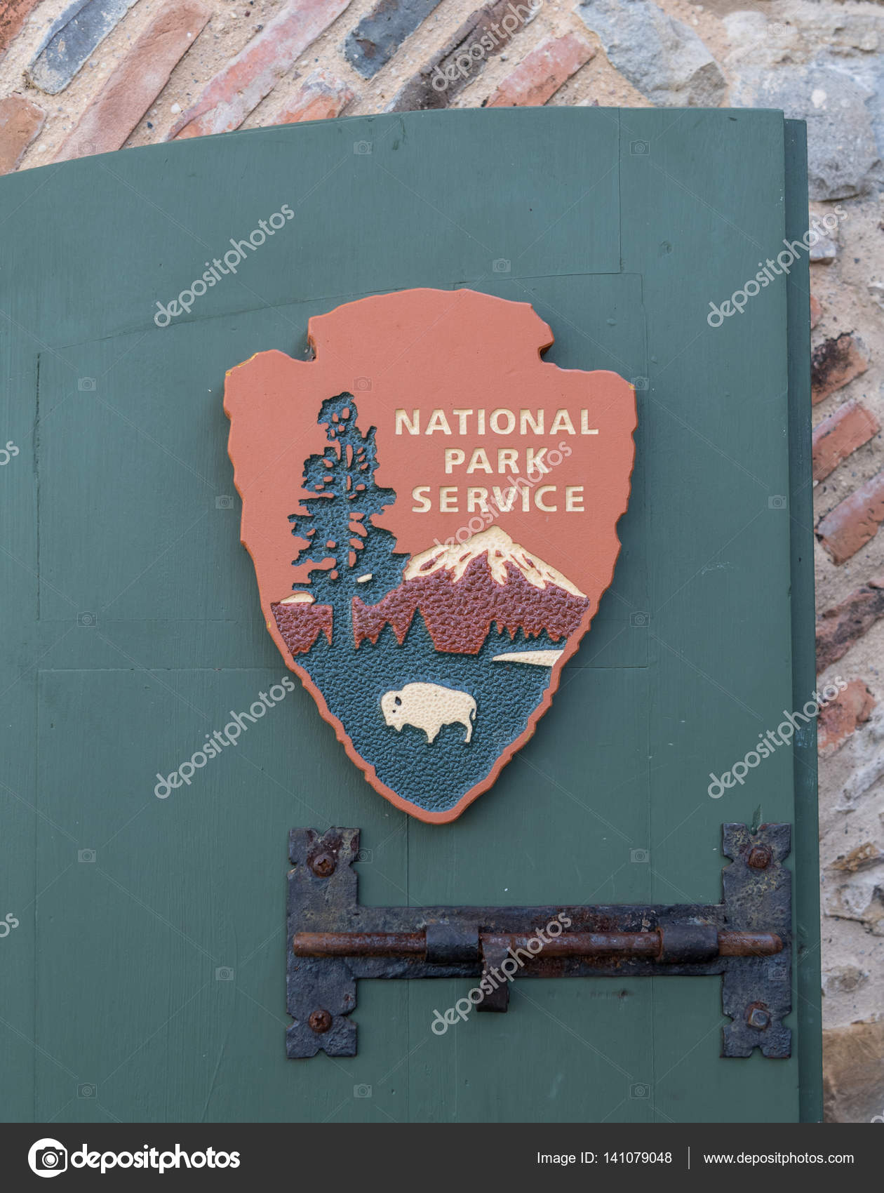 National Park Sign On Green Door Stock Editorial Photo