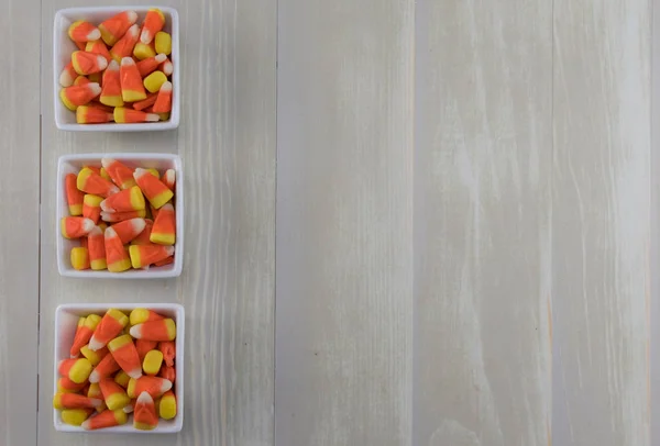 Три квадратних миски Candy кукурудза — стокове фото
