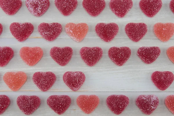 Rows of Dark Red and Pink Gummy Hearts with Empty Space — Stock Photo, Image