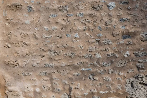 Muro de piedra áspera de estuco de la misión española — Foto de Stock
