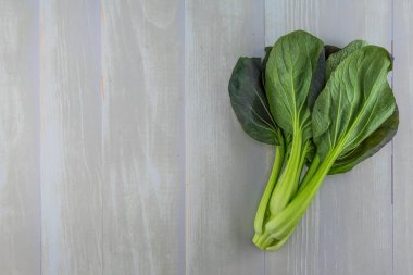 Küçük Bok Choy beyaz üzerine kurulu kopya alanı ile boyalı