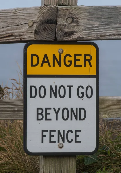 Danger Do Not Go Beyond Fence Sign