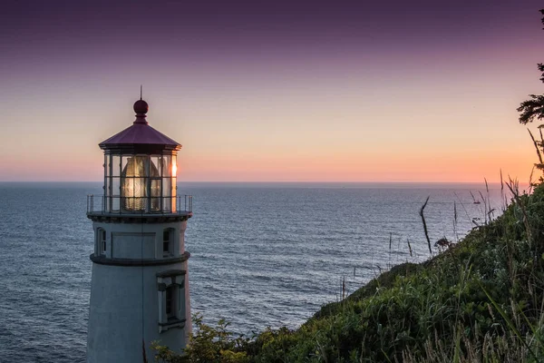 Farol de cabeça Heceta ao pôr do sol — Fotografia de Stock