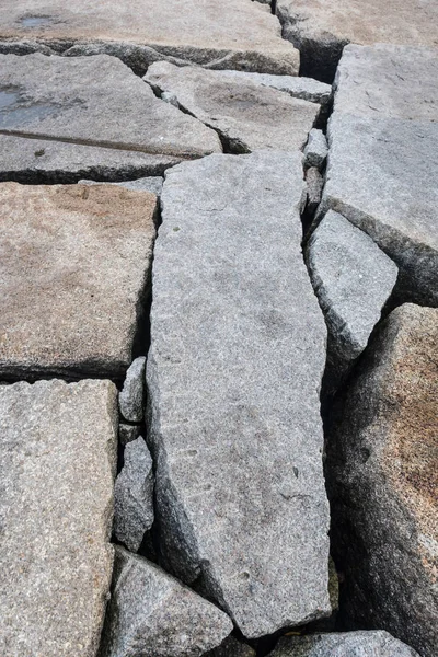 Granite Boulders Making Up a Breakwater