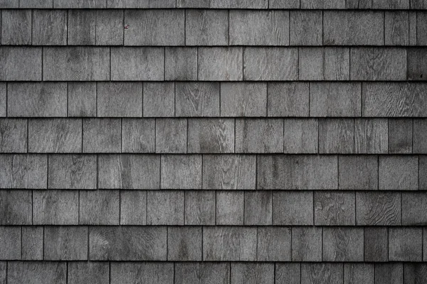 Grayed väderbitna Shake vägg närbild — Stockfoto