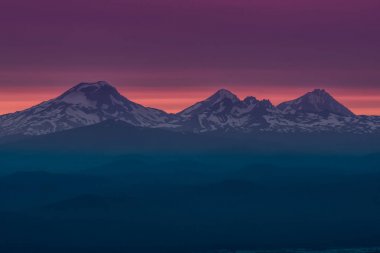 The Three Sisters at Sunset Near Bend  Oregon clipart