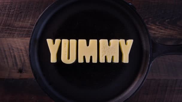 Butter Words Yummy Cast Iron Skillet Background — Stock Video