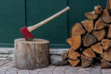 Close Up of Fire Wood and Axe clipart
