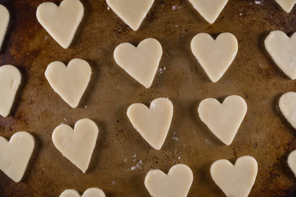 Close Up of Heart Shaped Cookie Dough on Sheet Pan — Stock Photo, Image
