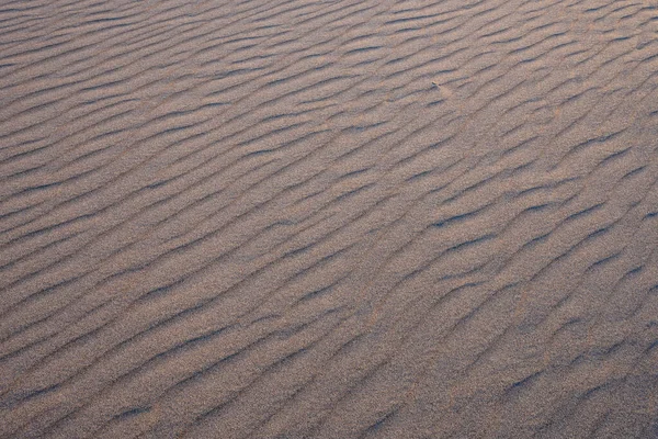 Textura de areia ondulada — Fotografia de Stock