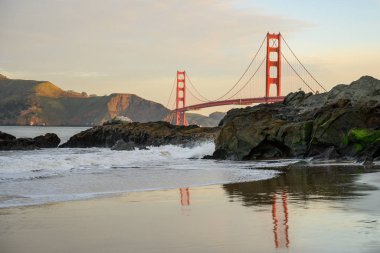 Golden Gate Reflects in Baker Beach Surf clipart