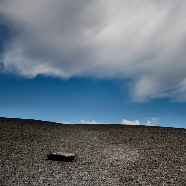 Single Rock Rests on Volcanic Hill Side — Stock Photo, Image