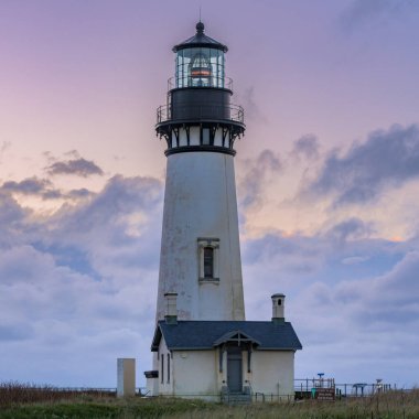 Sunset Over Yaquina Head Lighthouse along Oregon coast clipart