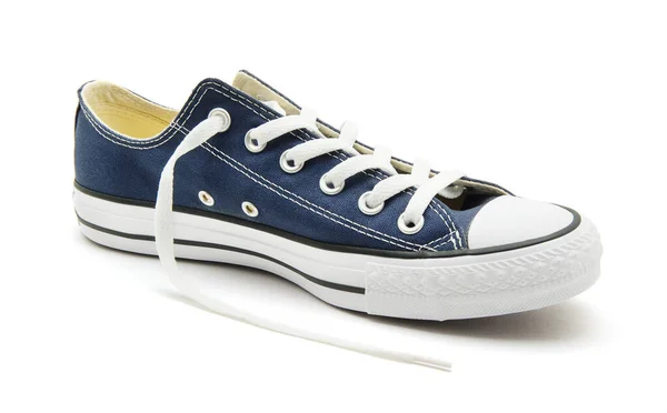 白色背景的蓝色运动鞋 — 图库照片