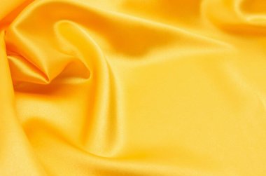 pürüzsüz altın rengi ipek arka plan olarak kullanılabilir
