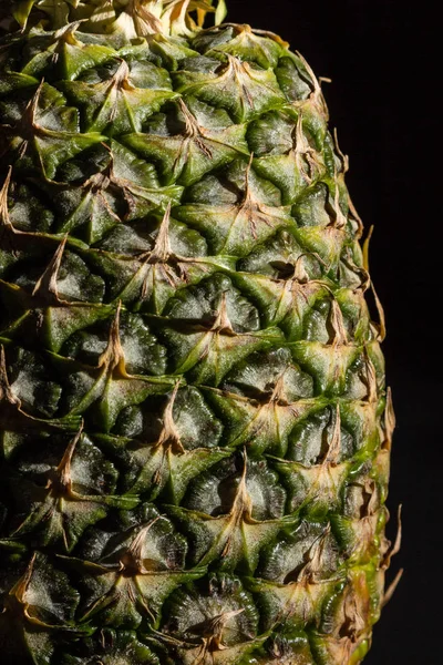 Pineapple Makro with black background and copy space