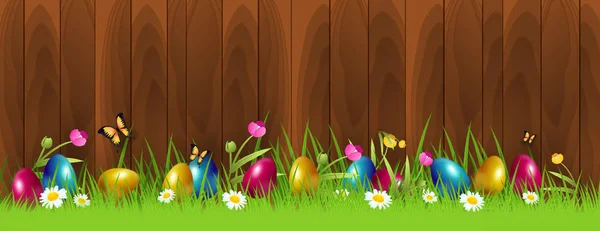 Fondo de Pascua con coloridos huevos de Pascua en la hierba —  Fotos de Stock