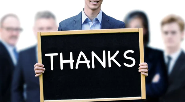 Empresário segurando um sinal com a palavra Obrigado — Fotografia de Stock