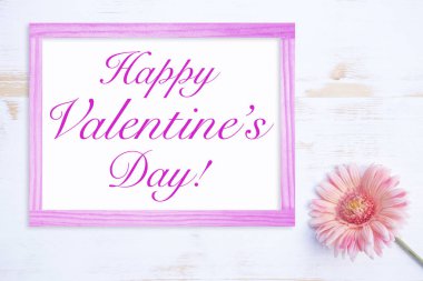 çerçeve ve kelime mutlu Sevgililer günü ile pembe çiçek