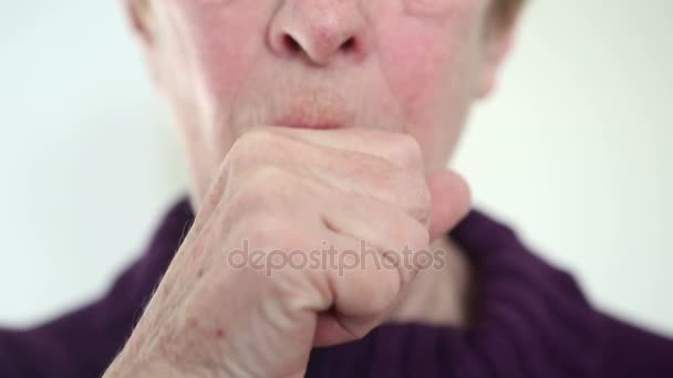 Closeup of older caucasian woman coughing — Stock Video