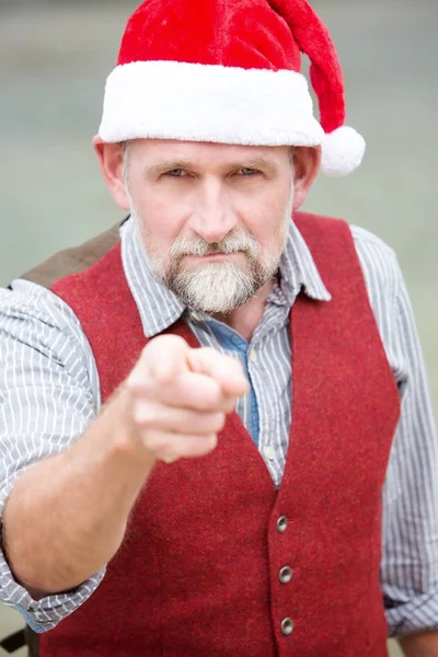 Portrait of man in his 50s with Santa hat — Stock Photo, Image