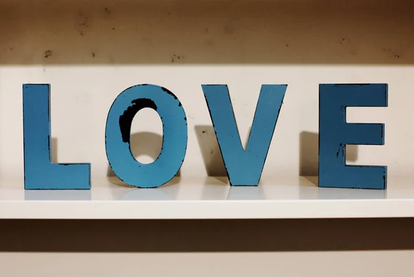 The word love out of wooden letters — Stock Photo, Image