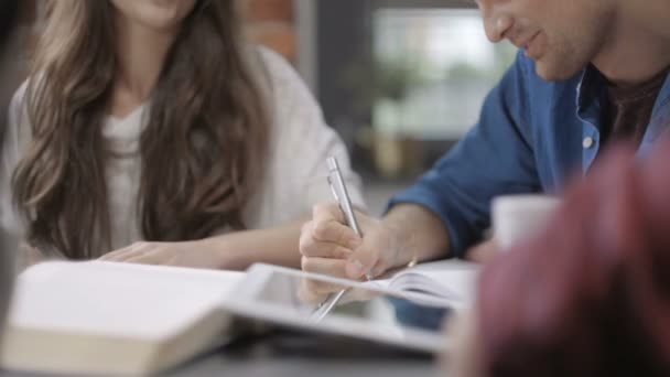 Close up of typing hands at classroom/office. — Stock Video