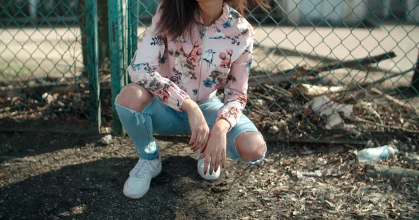 Unrecognizable portrait of a young African American woman wearing bomber jacket outdoors. — Stock Photo, Image