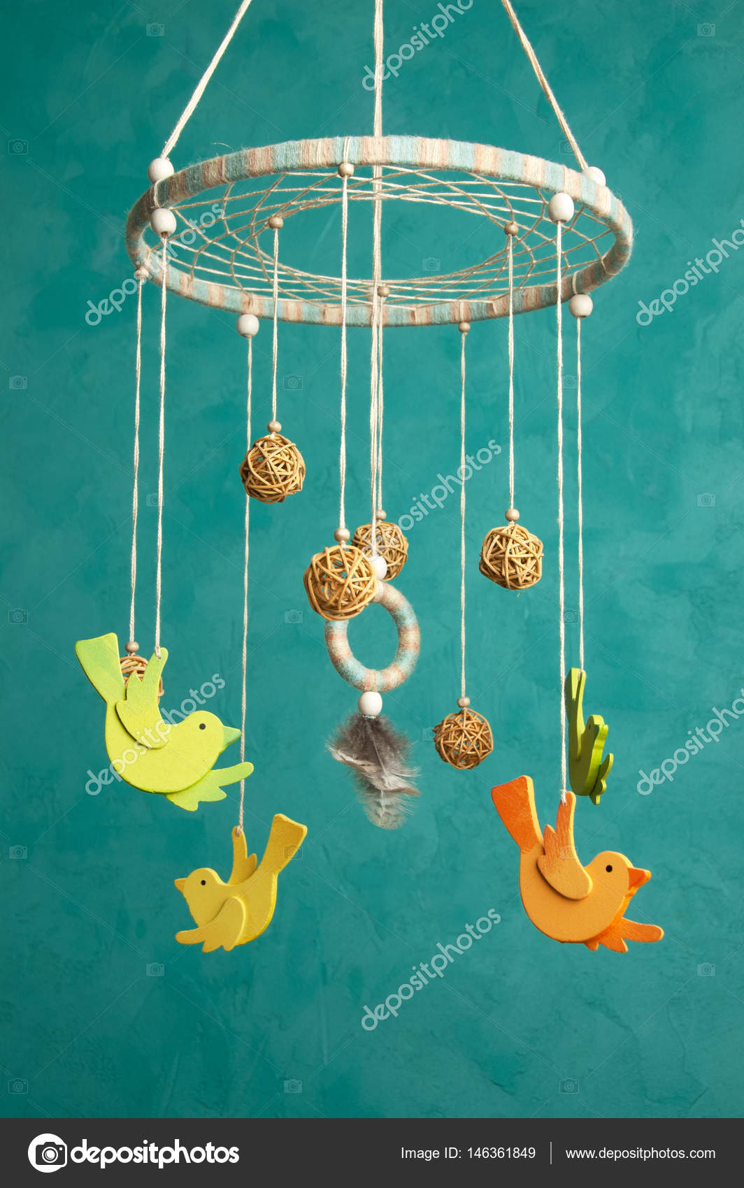 Baby Crib Mobile On Turquoise Background Stock Photo C Voisine