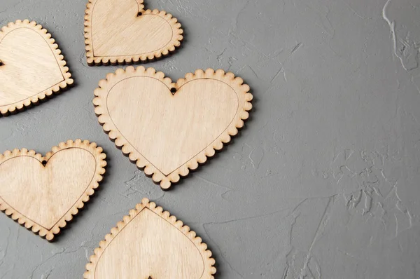 Wooden hearts on gray background — Stock Photo, Image