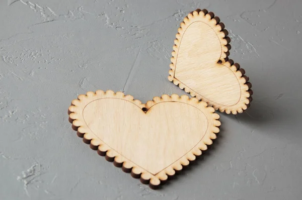 Wooden hearts on gray background — Stock Photo, Image