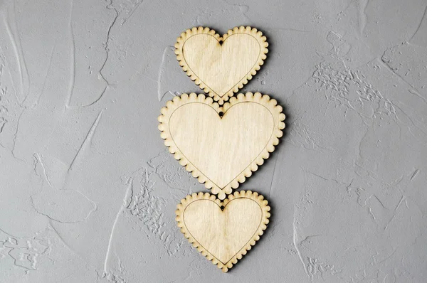 Wooden hearts on gray — Stock Photo, Image