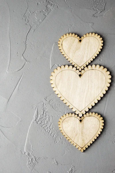 Wooden hearts on gray — Stock Photo, Image
