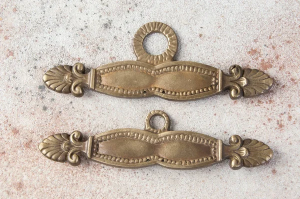 Античные бронзовые держатели для вышивки стен — стоковое фото