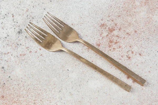 Two Old Bronze Forks Concrete Background Copy Space Text Food — Stock Photo, Image
