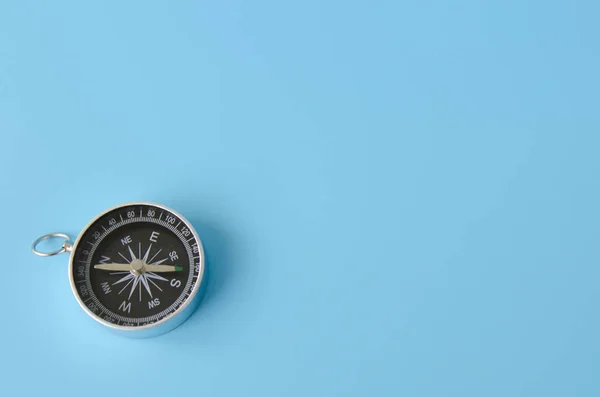 Compass on a blue background — Stock Photo, Image