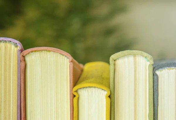 a stack of colorful books