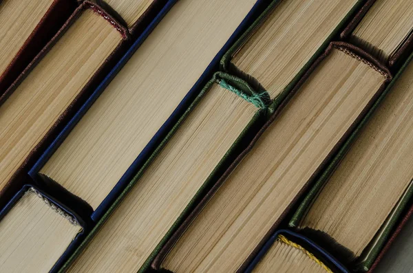 Top view of a row of colorful books — Stock Photo, Image