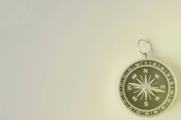 Compass isolated on gray background — Stock Photo, Image